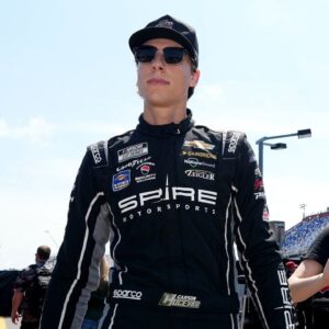 NASCAR Cup Series driver Carson Hocevar walks down pit lane prior to practice for the Cook Out Southern 500 at Darlington Raceway.