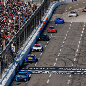 NASCAR Cup Series driver Martin Truex Jr. (19) leads the field down the front stretch during the Xfinity 500 at Martinsville Speedway.
