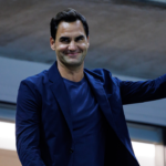 Roger Federer watches Aryna Sabalenka of Russia playing Qinwen Zheng of China on day nine of the U.S. Open tennis tournament