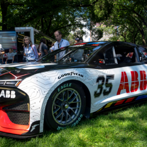 A prototype of an electric vehicle NASCAR, Motorsport, USA race car sits on the lawn during the NASCAR Xfinity Series The Loop 110 at the Chicago Street Course on July 06, 2024 in Chicago, Illinois. (Photo by Ben Hsu Icon Sportswire) AUTO: JUL 06 NASCAR Xfinity Series The Loop 110