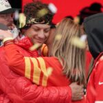 Kansas City Chiefs quarterback Patrick Mahomes (15) embraces his mother Randi Martin during the Kansas City Chiefs Super Bowl parade.
