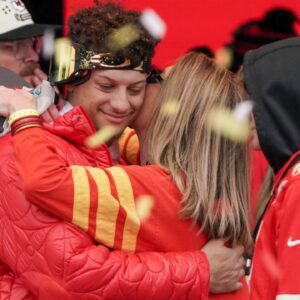 Kansas City Chiefs quarterback Patrick Mahomes (15) embraces his mother Randi Martin during the Kansas City Chiefs Super Bowl parade.