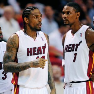 Miami Heat players (from left) guard (3) Dwyane Wade , forward (40) Udonis Haslem , forward (1) Chris Bosh and forward (6) LeBron James against the Phoenix Suns at the American Airlines Arena. Miami defeated Phoenix 123-96.