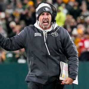 Nov 24, 2024; Green Bay, Wisconsin, USA; San Francisco 49ers head coach Kyle Shanahan argues with an official during the second quarter against the Green Bay Packers at Lambeau Field.
