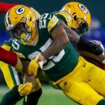 Green Bay Packers cornerback Keisean Nixon (25) tackles San Francisco 49ers wide receiver Jauan Jennings (15) on Sunday, November 24, 2024, at Lambeau Field in Green Bay, Wis. The Packers won the game, 38-10.