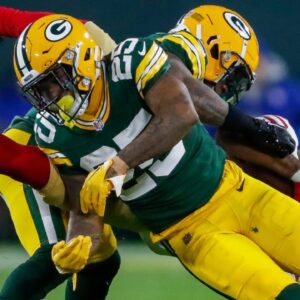 Green Bay Packers cornerback Keisean Nixon (25) tackles San Francisco 49ers wide receiver Jauan Jennings (15) on Sunday, November 24, 2024, at Lambeau Field in Green Bay, Wis. The Packers won the game, 38-10.