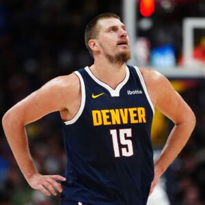 Denver Nuggets center Nikola Jokic (15) reacts in the second half against the Dallas Mavericks at Ball Arena.