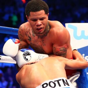 Francisco Fonseca is brought down by Gervonta Davis during a boxing match at T-Mobile Arena.