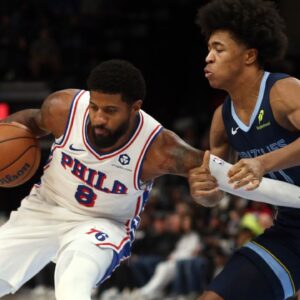 Philadelphia 76ers forward Paul George (8) drives to the basket as Memphis Grizzlies forward Jaylen Wells (0) defends during the first half at FedExForum.