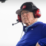 NASCAR auto racing team owner and former professional football coach Joe Gibbs watches the Texas 250 NASCAR race at the Texas Motor Speedway.