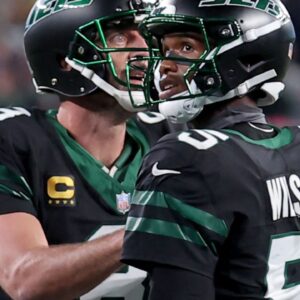 Aaron Rodgers and Garett Wilson