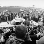 DAYTONA BEACH - FEBRUARY 24: American racing car driver Tiny Lund (1929 - 1975) (center) stands with his wife Ruth and Miss Firebird after winning the Daytona 500, Daytona Beach, Florida, February 24, 1963. Michael Rougier/The LIFE Picture Collection