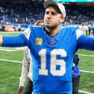 Detroit Lions quarterback Jared Goff (16) waves at fans as he exits the field after 52-6 win over Jacksonville Jaguars during the second half at Ford Field in Detroit on Sunday, Nov. 17, 2024.