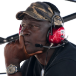 23XI Team co-owner Michael Jordan sits atop of the pitbox during the 4EVER 400 presented by Mobil 1 at Homestead-Miami Speedway.