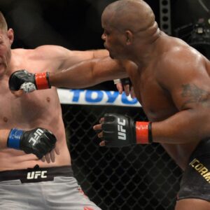Daniel Cormier lands a hit against Stipe Miocic during UFC 241 at Honda Center.