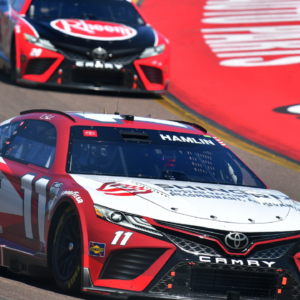 NASCAR Cup Series driver Denny Hamlin (11) leads driver Christopher Bell (20) during the United Rentals Work United 500 at Phoenix Raceway.