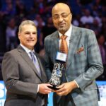 Magic CEO Alex Martins introduces former forward Dennis Scott