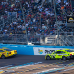 NASCAR Cup Series driver Joey Logano (22) leads Ryan Blaney (12) during the NASCAR Cup Series Championship race at Phoenix Raceway.