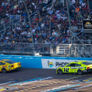 NASCAR Cup Series driver Joey Logano (22) leads Ryan Blaney (12) during the NASCAR Cup Series Championship race at Phoenix Raceway.