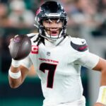 Houston Texans quarterback C.J. Stroud (7) runs with the ball in the second quarter, Thursday, October 31, 2024, in East Rutherford.
