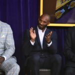 Shaquille O'Neal (left), Kobe Bryant (center) and Phil Jackson react during ceremony to unveil statue of former Los Angeles Lakers center O'Neal at Staples Center.