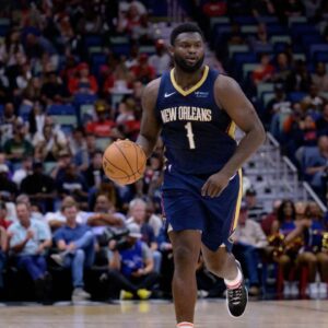 New Orleans Pelicans forward Zion Williamson (1) dribbles against the Cleveland Cavaliers during the first half at Smoothie King Center.