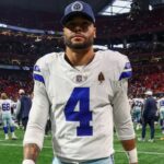 Nov 3, 2024; Atlanta, Georgia, USA; Dallas Cowboys quarterback Dak Prescott (4) walks off the field after a loss against the Atlanta Falcons at Mercedes-Benz Stadium.