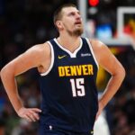 Denver Nuggets center Nikola Jokic (15) reacts in the second half against the Dallas Mavericks at Ball Arena