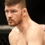 Michael Bisping (red gloves) during his fight against Kelvin Gastelum (blue gloves) during UFC Fight Night at Mercedes-Benz Arena.