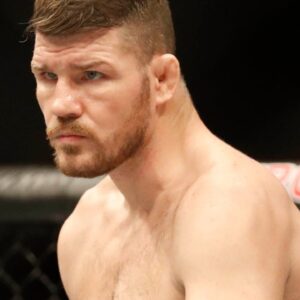 Michael Bisping (red gloves) during his fight against Kelvin Gastelum (blue gloves) during UFC Fight Night at Mercedes-Benz Arena.