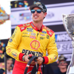 NASCAR Cup Series driver Joey Logano (22) celebrates his championship victory following the Cup Series championship race at Phoenix Raceway.