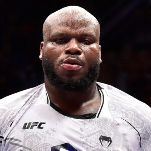 Derrick Lewis (blue gloves) reacts after losing to Jailton Almeida (not pictured) during UFC Fight Night at Ibirapuera Arena.