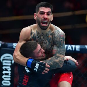 Ilia Topuria celebrates his championship victory against Alexander Volkanovski during UFC 298 at Honda Center