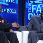 Feb 5, 2011; Dallas, TX, USA; Deion Sanders (left) and Michael Irvin at the 2011 Pro Football Hall of Fame announcement show at the Super Bowl XLV media center at the International Conference and Exposition Center.