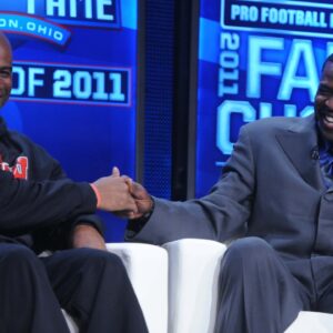 Feb 5, 2011; Dallas, TX, USA; Deion Sanders (left) and Michael Irvin at the 2011 Pro Football Hall of Fame announcement show at the Super Bowl XLV media center at the International Conference and Exposition Center.