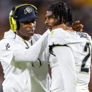 Oct 7, 2023; Tempe, Arizona, USA; Colorado Buffaloes head coach Deion Sanders reacts as he talks to son and quarterback Shedeur Sanders (2) after a penalty against the Arizona State Sun Devils in the second half at Mountain America Stadium.