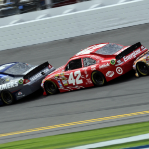 NASCAR Sprint Cup Series drivers Kasey Kahne (5) and Juan Pablo Montoya (42) and Denny Hamlin (11) draft during practice for the Daytona 500 at Daytona International Speedway.