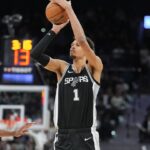 San Antonio Spurs center Victor Wembanyama (1) shoots in the second half against the Golden State Warriors at Frost Bank Center.