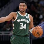 Milwaukee Bucks forward Giannis Antetokounmpo (34) brings the ball up the court against the Cleveland Cavaliers in the second half at Fiserv Forum.
