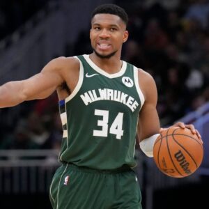 Milwaukee Bucks forward Giannis Antetokounmpo (34) brings the ball up the court against the Cleveland Cavaliers in the second half at Fiserv Forum.