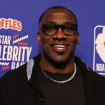 Team Shannon coach Shannon Sharpe on the red carpet before the All Star Celebrity Game at Lucas Oil Stadium.