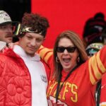 Kansas City Chiefs quarterback Patrick Mahomes (15) celebrates with his mother Randi Martin during the Kansas City Chiefs Super Bowl parade.