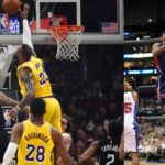 LeBron James (L), Josh Smith (R)