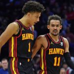 Atlanta Hawks forward Jalen Johnson (1) and guard Trae Young (11) against the Philadelphia 76ers during the fourth quarter at Wells Fargo Center.