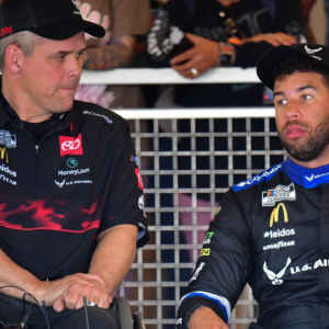NASCAR Cup Series driver Bubba Wallace (23) with crew chief Bootie Barker during Cup Series practice at Phoenix Raceway.