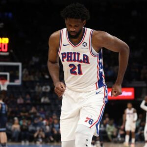 Philadelphia 76ers center Joel Embiid (21) limps to the bench during a time out during the second half against the Memphis Grizzlies at FedExForum