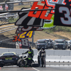 Pit crews for NASCAR Cup Series driver William Byron (24) swap out a tire on the vehicle during the Toyota / Save Mart 350 at Sonoma Raceway.