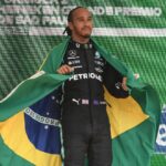 F1 Grand Prix of Brazil .Lewis Hamilton of Great Britain and team Mercedes with the Brazilian flag to honor his hero Ayrton Senna November 14, 2021 At Interlagos, Brazil