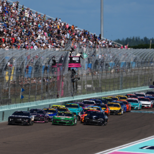NASCAR Cup Series driver Kyle Busch (8) and NASCAR Cup Series driver Joey Logano (22) lead the field to restart the Straight Talk Wireless 400 at Homestead-Miami Speedway.