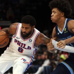 Philadelphia 76ers forward Paul George (8) drives to the basket as Memphis Grizzlies forward Jaylen Wells (0) defends during the first half at FedExForum.